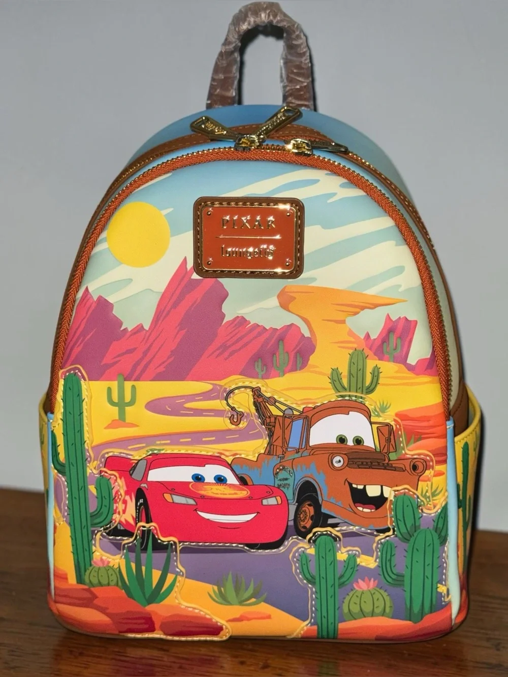 Loungefly Disney Pixar Cars Lightning McQueen and Mater Mini Backpack